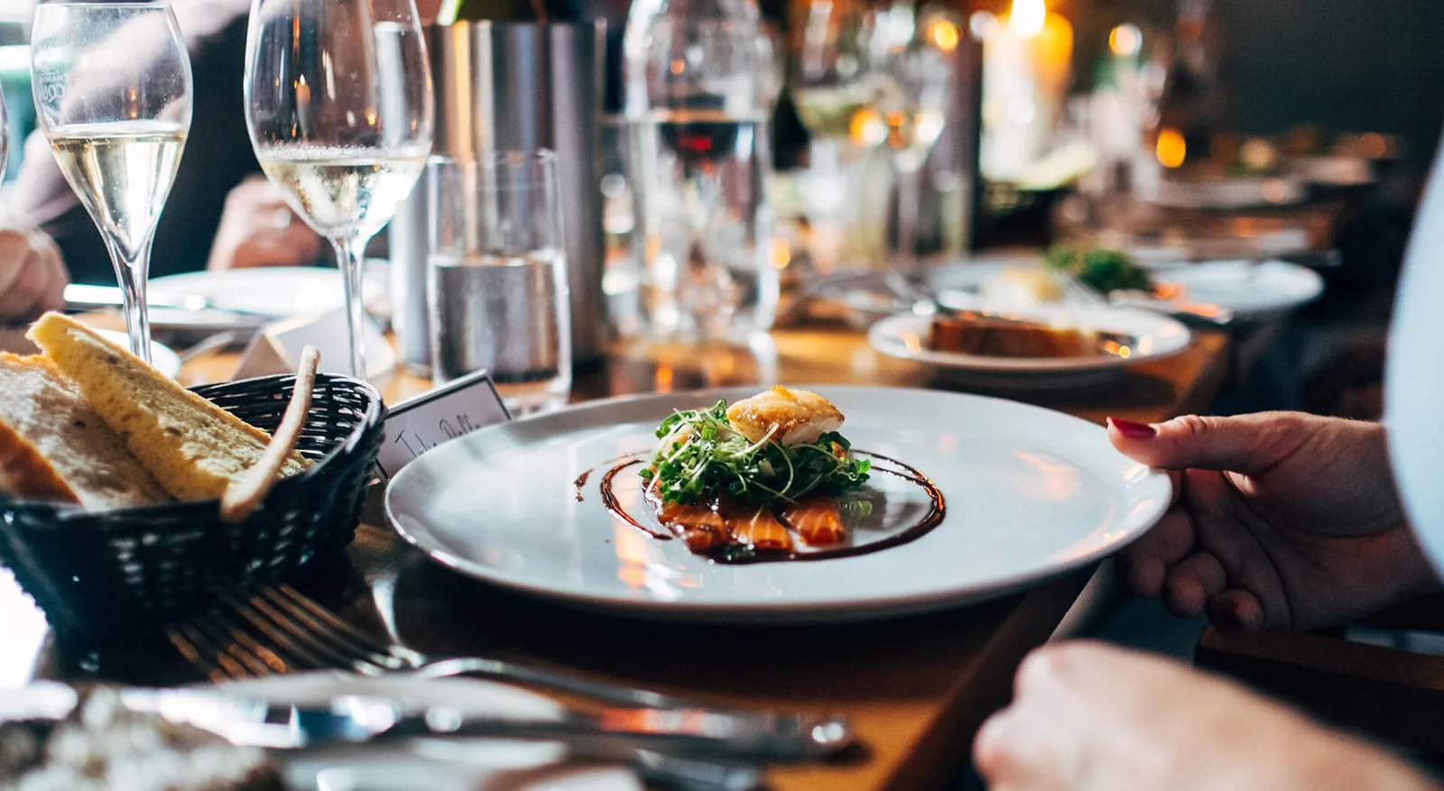 A beautifully plated dish at a dining table
